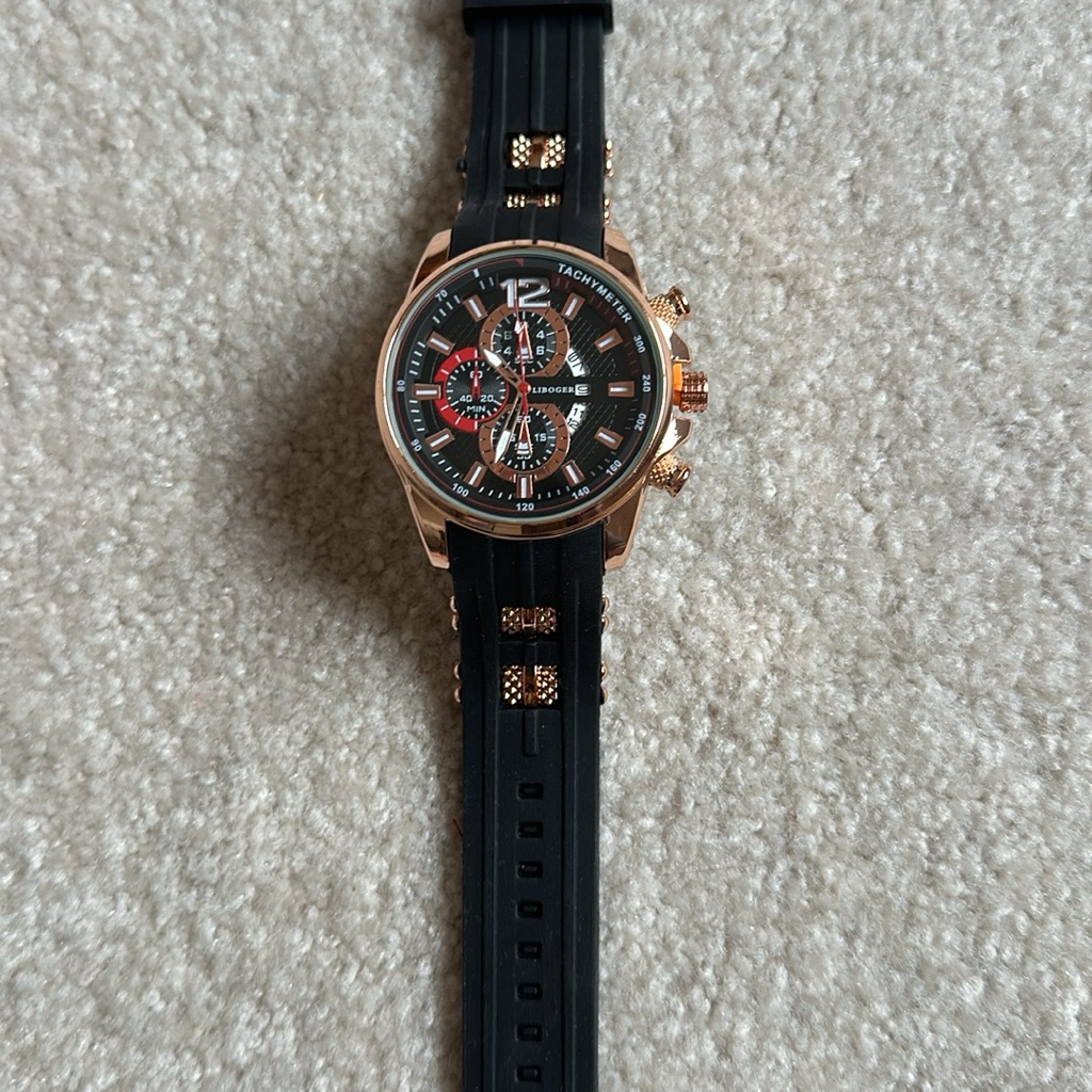Black And Gold Chronograph Watch